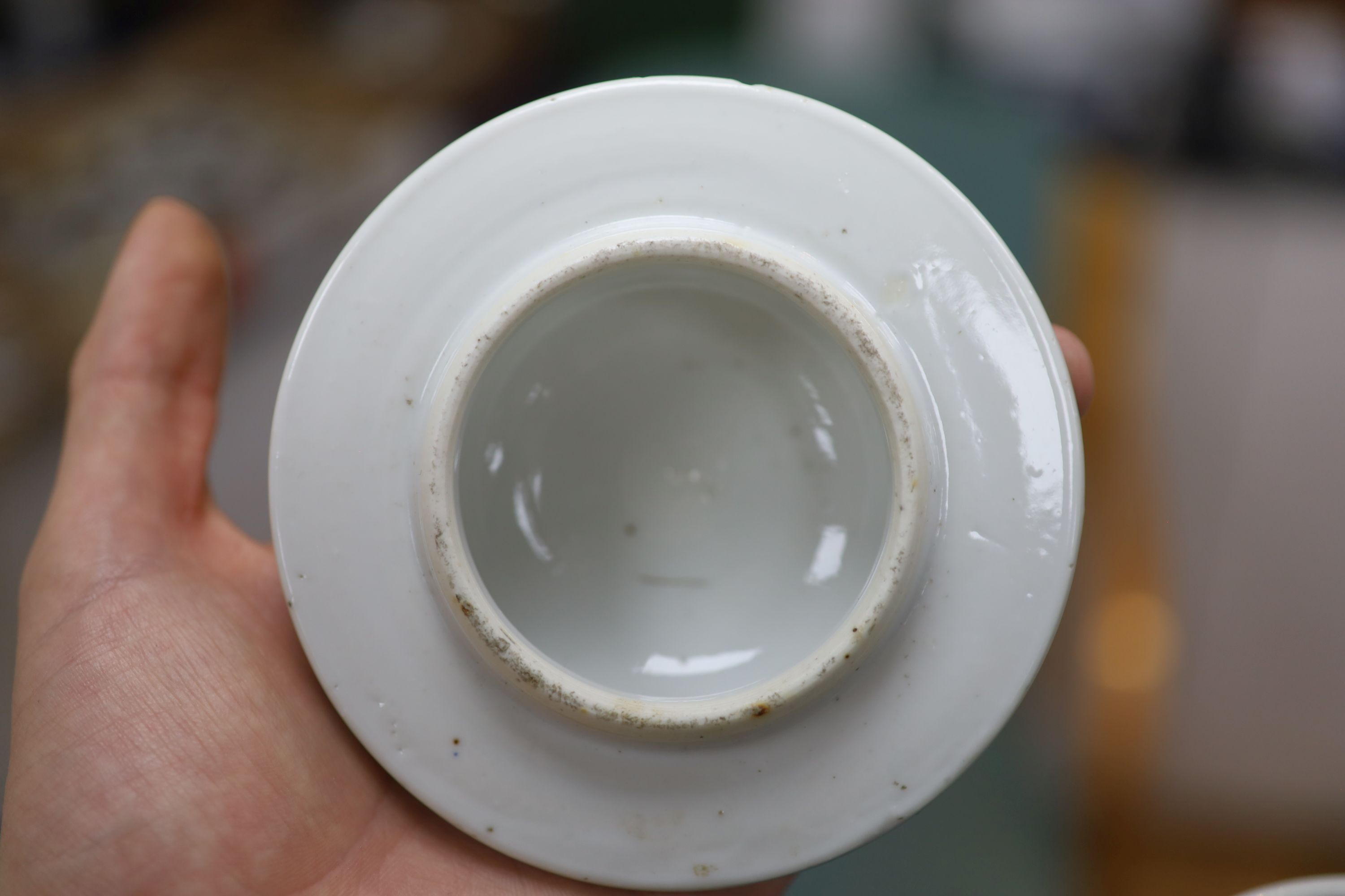 A 20th century Chinese blue and white jar and cover with prunus decoration, height 25cm